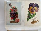 two pictures of pansies in a vase on a table