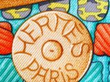 an image of a close up of a purse with a button on it