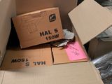 a cardboard box that has been left in the middle of a room
