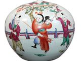 a white vase with a picture of a woman on it