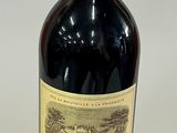 a bottle of wine that is sitting on a table