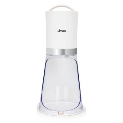 un gros plan d'une cafetière blanche sur fond blanc