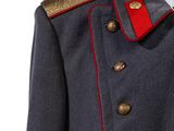 a close up of a military coat with red trims on a mannequin mannequin mannequin mannequin mannequin mannequin mann
