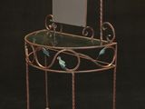 une petite table sur laquelle se trouve un miroir