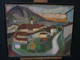 a picture of a painting on a easel in a room