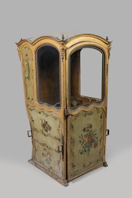 an old wooden cabinet with a floral design on it