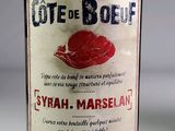 a bottle of wine that is on a table