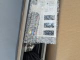 a box with a computer inside of it on a table