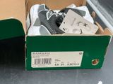 a box that has a pair of shoes in it