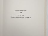 an open book with a black and white picture on it