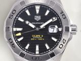 a close up of a watch on a white surface
