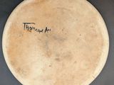 a picture of a white plate with writing on it