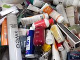 many different types of skin care products in a bin