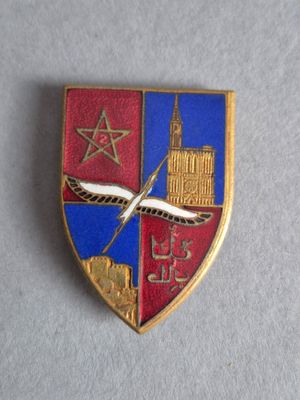 une image représentant un insigne orné d'une étoile