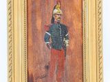 tableau représentant un soldat en uniforme, dans un cadre doré, sur fond blanc