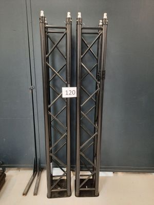 pair of black metal stands with numbers on them in a room