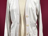 an image of a white jacket on a mannequin