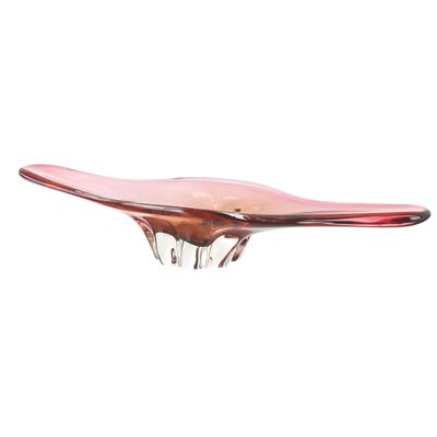 an image of a pink glass bowl on a white background