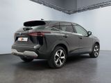 the rear end of a gray 2020 toyota rav parked in a garage