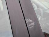 a sticker on the window of a car with a hand print