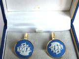 Ensemble de boutons de manchette et de pince à cravate bleus et dorés, présenté dans un coffret cadeau