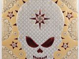 a close up of a painting of a skull with stars on it