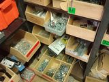 many boxes and bins of assorted items on the floor