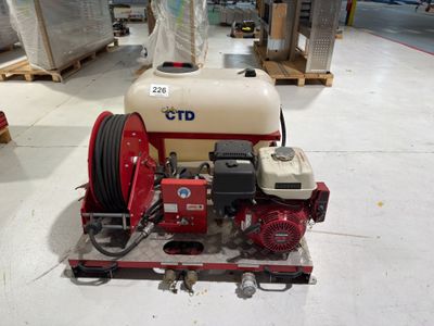a picture of a red and white fire hydrant in a warehouse