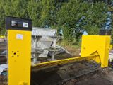 a close up of a machine that is sitting in the dirt