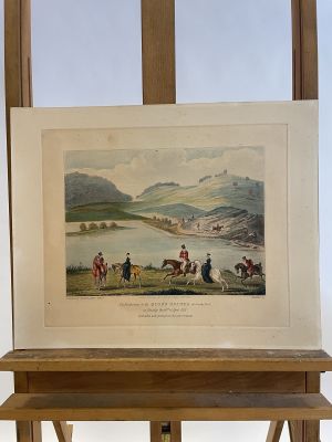 a picture of a painting on a easel in a room