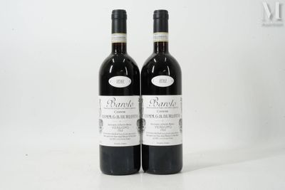 two bottles of wine sitting next to each other on a white surface