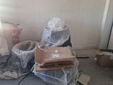 a room that has a lot of boxes and boxes on the floor