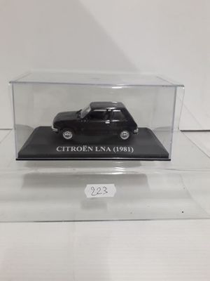 an image of a black car in a clear case on a table