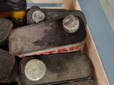 a box full of old skateboards sitting on a table