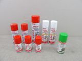 many sprays of different colors and sizes on the table