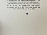 a close up of a page of a book with a picture of a clock on it