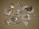 many bags of food that are sitting on the floor