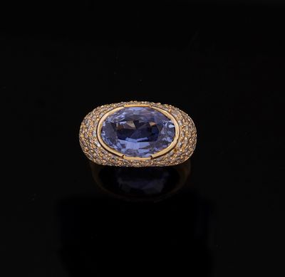an oval tanzane sapphire and diamond ring