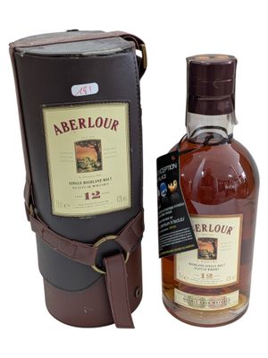 an image of a bottle of aberlour next to a leather case