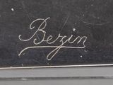 a close up of a black car with the word bergo written on it
