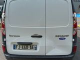 a white van that is parked in a parking lot