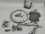 a lot of silver items that are on the table