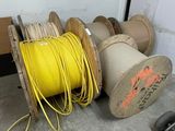 a spool and a spool on a cart in a garage