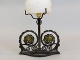 wrought iron and glass table lamp with a white glass shade