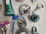 supplies laid out on a table including scissors, yarn, scissors, and other items