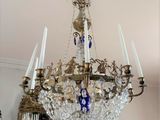 a chandelier that is hanging from the ceiling