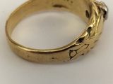an image of a close up of a ring on a white surface