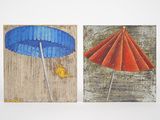 two paintings of umbrellas painted on the wall