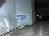 a close up of a piece of metal with a label on it