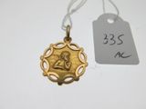 an image of a gold pendant with a woman on it